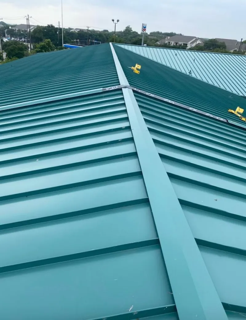 Green commercial metal roof ridge and valley for Metal Roof Repair in Waterbury